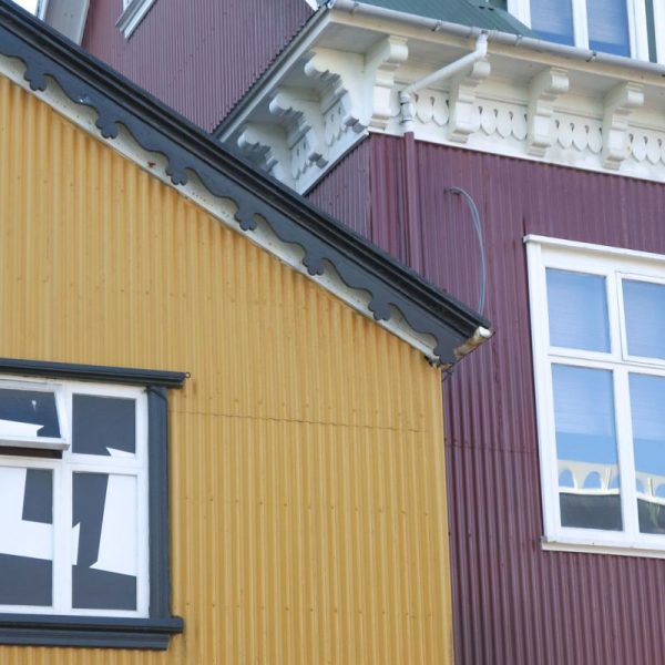 Photo of Two Metal Buildings Next to Each Other